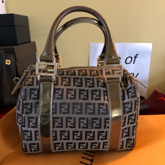 Fendi Handbags - Mini gold fendi bauletto bag!